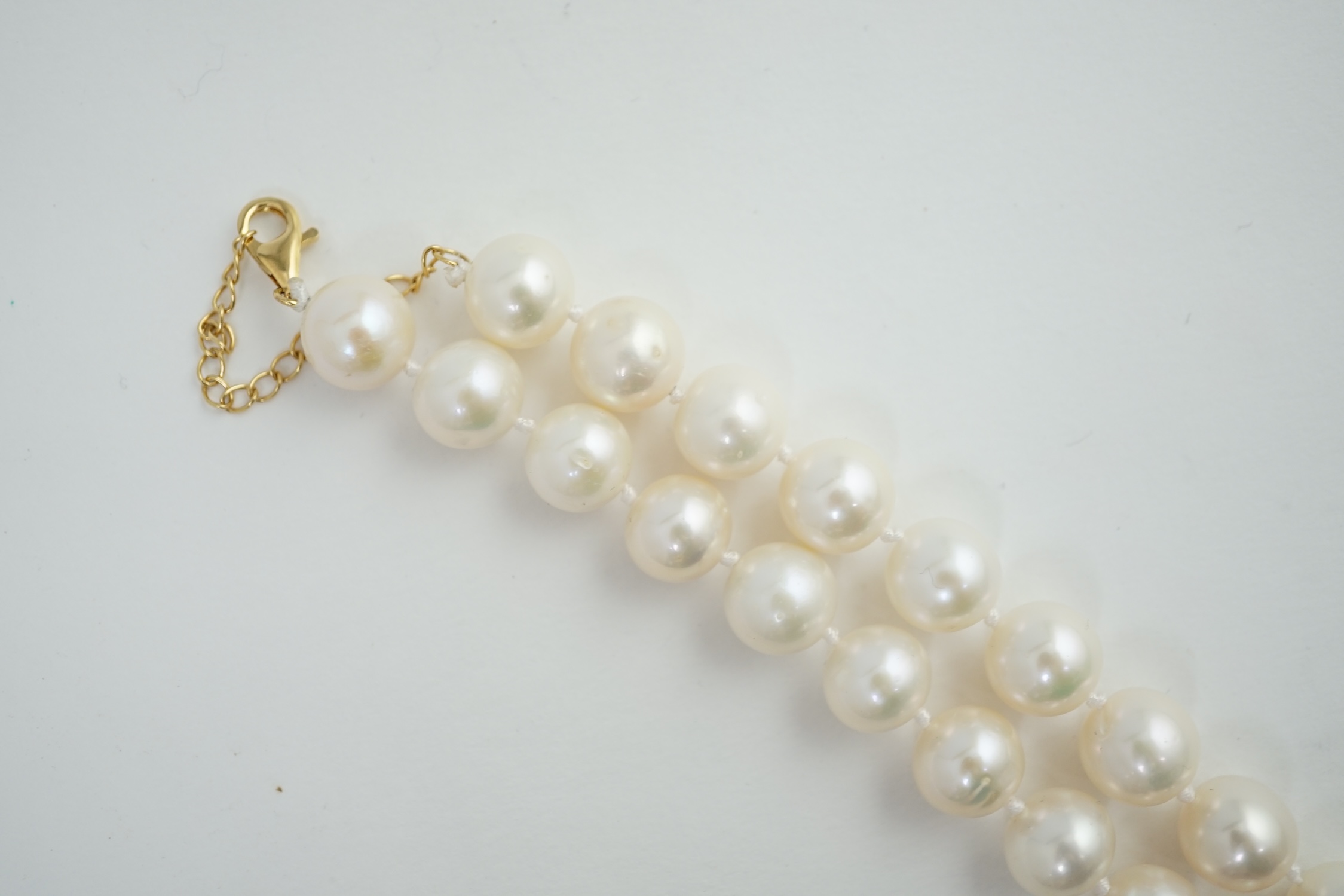 A single strand graduated South Sea pearl necklace, with 18k gold chain and clasp